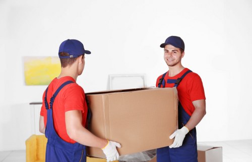 Man with a van loading furniture for a London move