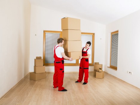 Local removals team planning access on a London street
